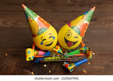 date April 1. Creative concept for April Fools' Day. Festive decor on the wooden background.