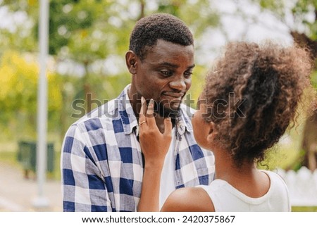 Date couple man and women valentine day. African black lover at park outdoors summer season vintage color tone