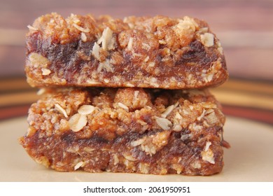 Date Fruit Chocolate Bar In A Plate On Table 