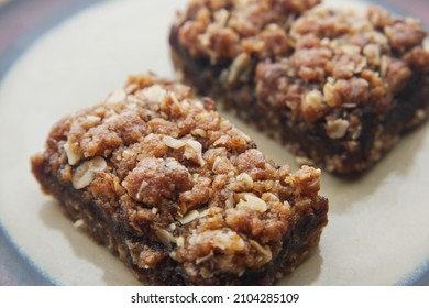 Date Fruit Chocolate Bar In A Plate On Table 