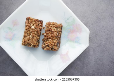 Date Fruit Chocolate Bar In A Plate On Table 