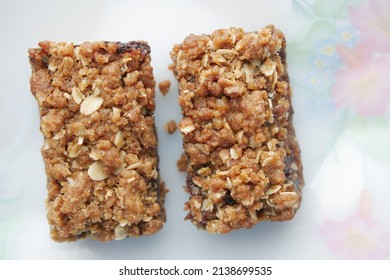 Date Fruit Chocolate Bar In A Plate On Table 