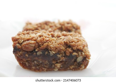 Date Fruit Chocolate Bar In A Plate On Table 