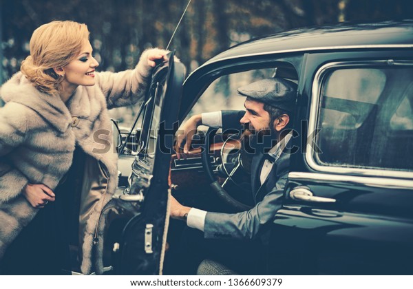 date\
of happy couple in love. date of couple at retro\
car