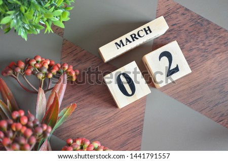 Date of March month. Diamond wood table for background.