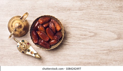 Dates With Arabic Coffee Pot Top View