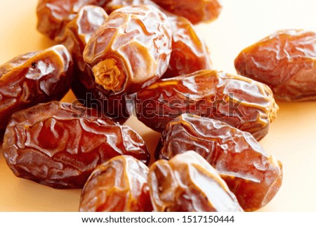 Dates close-up on the table. Dried fruits, healthy and diet food
