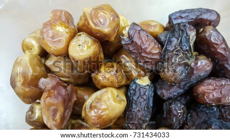  Dates  fruit are one of the best sweet and versatile foods that can regulate the digestive process. They can significantly boost energy levels in people within half an hour of consumption Stock photo © 