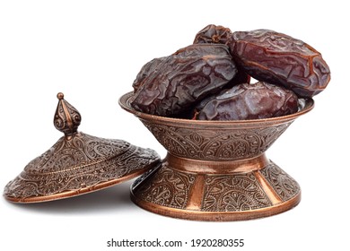 Dates on a bronze plate isolated.