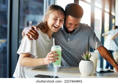 Dating, restaurant and couple with smoothie drink hugging, having fun and laughing together on romantic date. Love, relationship and interracial couple enjoying milkshake, cocktail and juice in cafe - Powered by Shutterstock