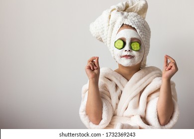 daughter in bathrobes at home - Powered by Shutterstock