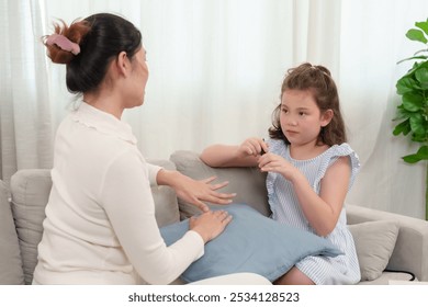 Daughter focused while painting her mother’s nails during their bonding time at home. The moment reflects the close connection, affection, and fun they share, creating a beautiful memory together. - Powered by Shutterstock