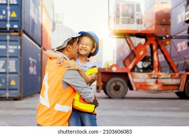 
Daughter Hugs Father At Work : Happy Time In The Family Of An Engineer-worker Father The Little Daughter Gave Her A Hug And Kissed Her Cheek At Work. And Both Pay Attention To Safety Equipment.
