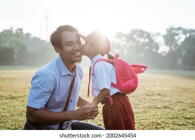 Daughter Kiss Her Father Cheek On First Day Primary School In The Morning