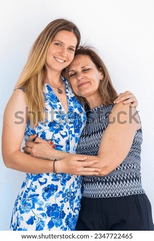 Similar – Woman taking selfie with older mother in wheelchair