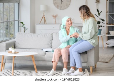 Daughter visiting her mother after chemotherapy at home - Shutterstock ID 1946812828