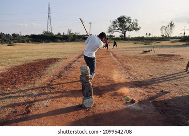 Davangere, Karnataka, India - Jan 01, 2022: A Few Village Indian Boys Are Playing Gully Cricket.