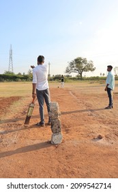 Davangere, Karnataka, India - Jan 01, 2022: A Few Village Indian Boys Are Playing Gully Cricket.