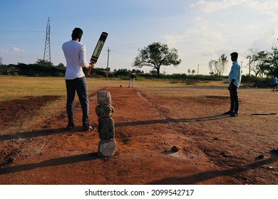 Davangere, Karnataka, India - Jan 01, 2022: A Few Village Indian Boys Are Playing Gully Cricket.