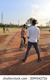 Davangere, Karnataka, India - Jan 01, 2022: A Few Village Indian Boys Are Playing Gully Cricket.