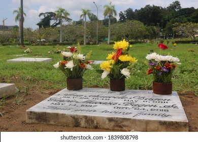 Davao City, Philippines - October 24, 2020. Visiting and remembering our dearly-departed loved ones early for the All-Souls Day Celebration at Buhangin Memorial Park, Buhangin, Davao City.