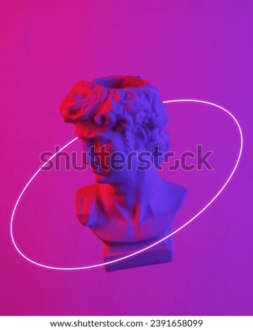 David bust floating in the air, isolated in blue-red neon gradient light with ring. Levitating objects. Minimal concept