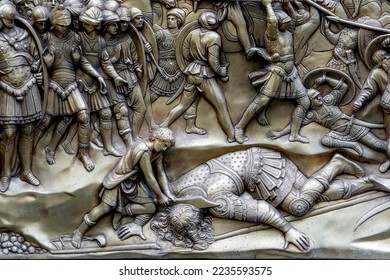 David killing Goliath in a panel of the Gates of Paradise, by Lorenzo Ghiberti, door of the Baptistry, Florence city center, Tuscany region, Italy
