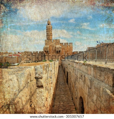 David's tower (citadel) of the Old city of Jerusalem. Old paper texture. Aged textured photo in retro style