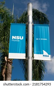 DAVIE, FL, USA - JULY 1, 2022: Campus Flag And Banner On The Campus Of Nova Southeastern University.