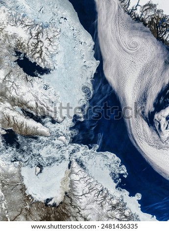 Davis Strait. . Elements of this image furnished by NASA.
