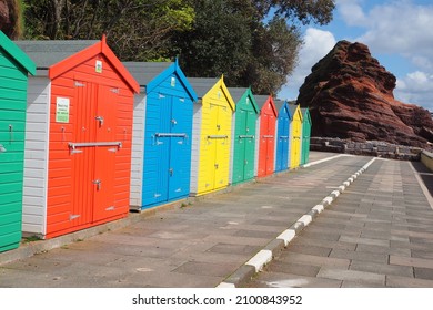 DAWLISH, UNITED KINGDOM - May 04, 2019: A Daylight Shot Of Colorful Beach Huts On The Promenade In Dawlish, UK