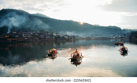 Dawn at Ban Rak Thai, Mae Hong Son - Mist rising off the lake - Shutterstock ID 2255633421