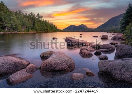 Dawn colors Jordan Pond in Acadia National Park Maine 