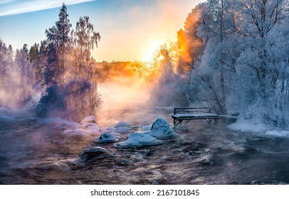 Dawn fog over a winter forest river. Morning fog on winter forest river. Winter river in morning fog at dawn. Winter forest river in fog at dawn - Shutterstock ID 2167101845