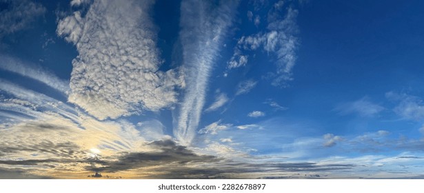 Dawn. Morning sun, white clouds and blue sky panoramic background - Shutterstock ID 2282678897