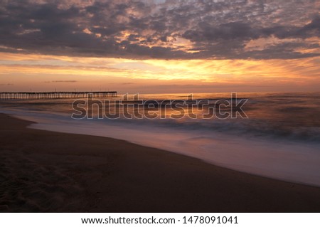 Dawn at NC, OBX beach, distant pier, smooth surf