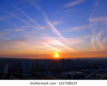 Dawn Over The City And Blue Sky