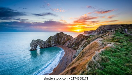 Dawn over the sea coast. Beautiful sunrise over coastline. Sea coast at dawn. Panoramic landscape of sea coast at dawn - Shutterstock ID 2174838171