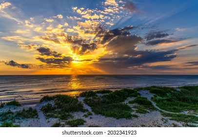 Dawn over the sea horizon. Beautiful sunrise ove sea. Sunrise sea landscape. Sea sky at dawn