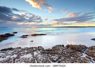 Dawn skies and ocean beach Jervis Bay NSW Australia
