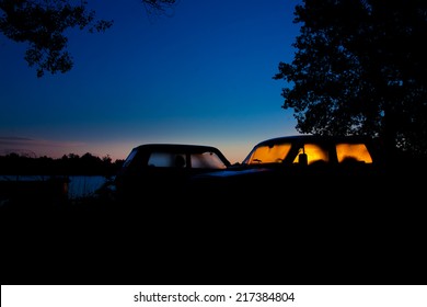 Dawn Sun Through The Steamy Car Windows On The River Bank 