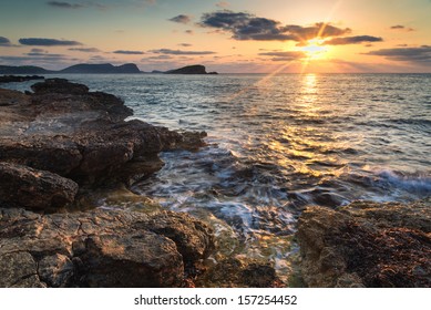 Dawn sunrise landscape over beautiful rocky coastline in Mediterranean Sea - Powered by Shutterstock