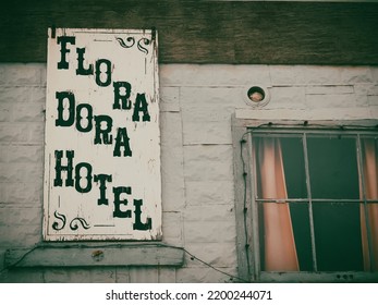 Dawson City Yukon Territory, Canada - August 5 2008; Remains Of Sign On Long Closed Fora Dora Hotel A Remnant From 1800's Gold Mining Era