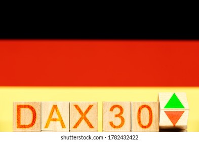 Dax 30 Index Concept. Wooden Blocks With Dax30 Inscription And A Block Symbolizing The Rise And Fall Of The Market