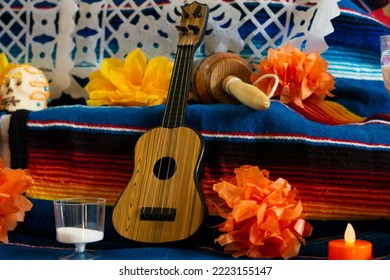 Day Of The Dead In Mexico, An Altar With Photographs Of Missing People. Dia De Los Muertos Mexican National Holiday, Guitar, Tequila And Maracas. Food And Drink, Cactus And Burn