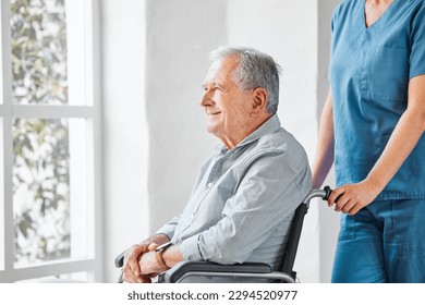 The day feels better after I admire the world. Shot of a nurse caring for a senior man in a wheelchair in a retirement home. - Powered by Shutterstock