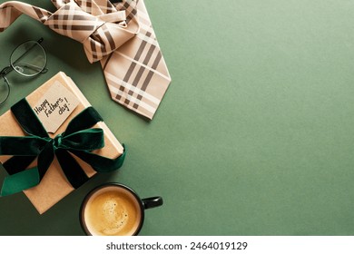 Father’s Day flat lay with coffee, glasses, gift with "Happy Father’s Day!" label, and necktie on a green background. Ideal for seasonal promotions and greeting card designs - Powered by Shutterstock