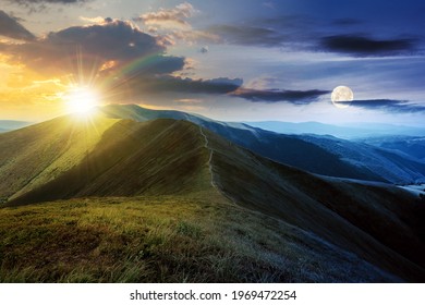 Day And Night Time Change Concept Above Mountain Landscape In Summer. Grassy Meadows On The Hills Rolling In To The Distant Peak Beneath Sky With Sun And Moon