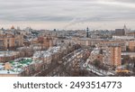 Day to Night Transition timelapse: Aerial Panoramic View of Moscow City. Features Moscow Youth Palace, Komsomol Avenue, Residential Buildings, and Urban Winter Snow Scenery. Architectural Background