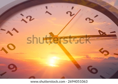 Day Time, Time clock face double exposure with summer morning sun rise beautiful sky background.